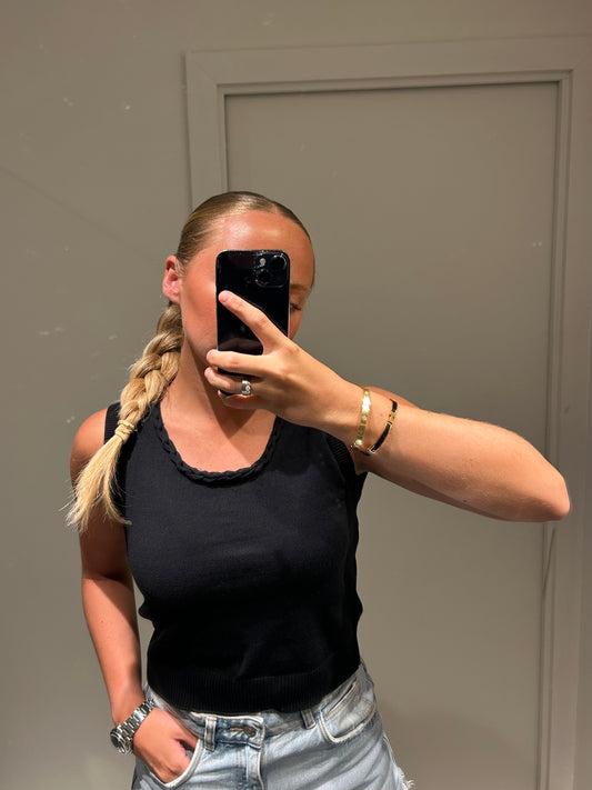 Black vest with rope detail